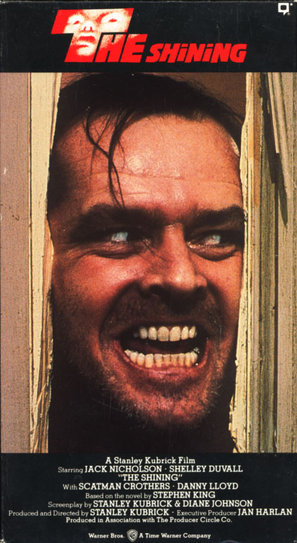The Shining VHS cover art. Movie starring Jack Nicholson, Shelley Duvall. With Danny Lloyd, Scatman Crothers, Barry Nelson. Directed by Stanley Kubrick. Based on a novel by Stephen King. 1980.