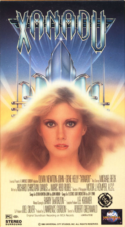 Xanadu VHS cover art. Movie starring Olivia Newton-John, Gene Kelly. With Michael Beck, Teri Beckerman, Sandahl Bergman. Directed by Robert Greenwald. 1980.