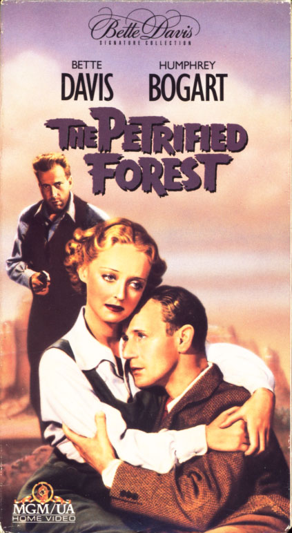The Petrified Forest VHS cover art. Movie starring Leslie Howard, Bette Davis, Humphrey Bogart, Genevieve Tobin, Dick Foran. Directed by Archie Mayo. Based on a play by Robert E. Sherwood. 1936.