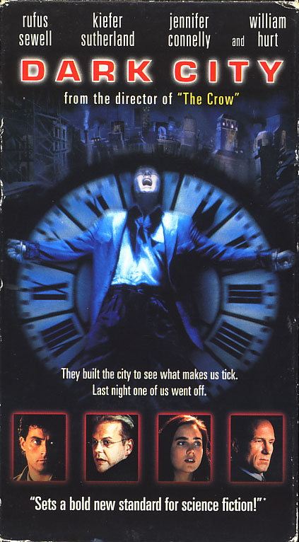 Dark City VHS cover art. Movie starring Rufus Sewell, Kiefer Sutherland, Jennifer Connelly. With William Hurt, Richard O'Brien. Directed by Alex Proyas. 1998.