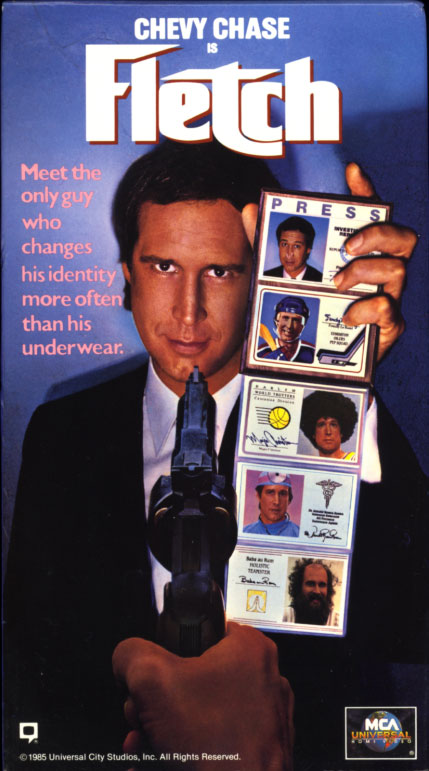 Fletch VHS cover art. Movie starring Chevy Chase, Dana Wheeler-Nicholson, Tim Matheson, Richard Libertini, Joe Don Baker. With M. Emmet Walsh, George Wendt, Geena Davis, Kareem Abdul-Jabbar. Based on the book by Gregory McDonald. Directed by Michael Ritchie. 1985.