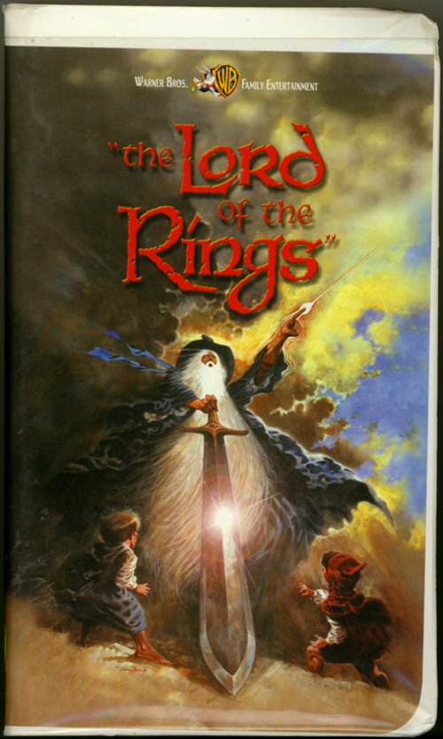Lord of the Rings VHS cover art. Animated movie starring Christopher Guard, William Squire, Michael Scholes, John Hurt. Directed by Ralph Bakshi. From the novels "The Fellowship of the Ring" and "The Two Towers" by J.R.R. Tolkien. 1978.