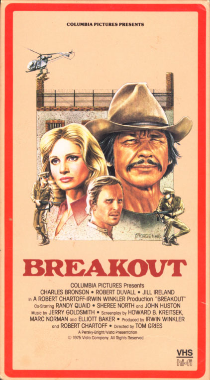 Breakout VHS box cover art. Action adventure drama movie starring Charles Bronson, Robert Duvall, Jill Ireland. With Randy Quaid, Sheree North, John Huston. Directed by Tom Gries. 1975.