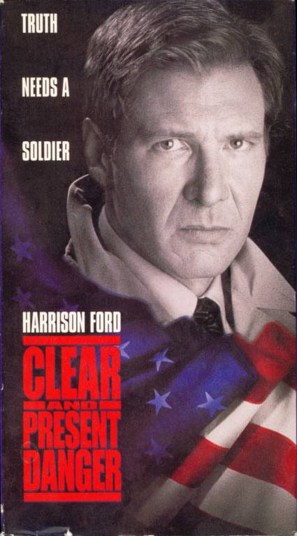 Clear and Present Danger on VHS. Movie starring Harrison Ford. With Willem Dafoe, Anne Archer, Joaquim de Almeida, Henry Czerny, Thora Birch, James Earl Jones. Directed by Phillip Noyce. From a Tom Clancy novel. 1994.