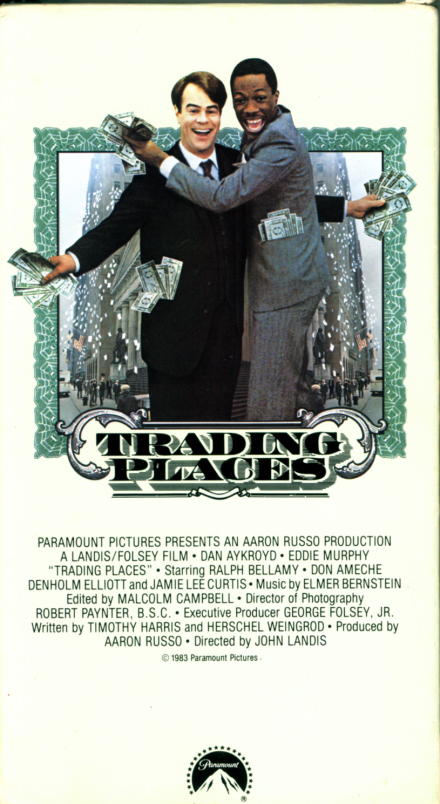 Trading Places on VHS video. Starring Eddie Murphy, Dan Aykroyd. With Denholm Elliott, Ralph Bellamy, Don Ameche, Jamie Lee Curtis. Directed by John Landis. 1983.