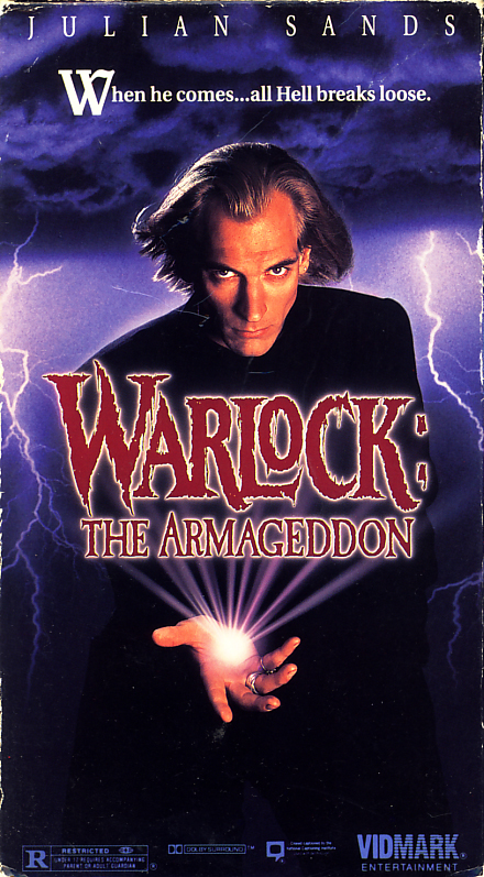 Warlock: The Armageddon on VHS. Horror fantasy movie starring Julian Sands, Chris Young, Paula Marshall. Directed by Anthony Hickox. 1993.